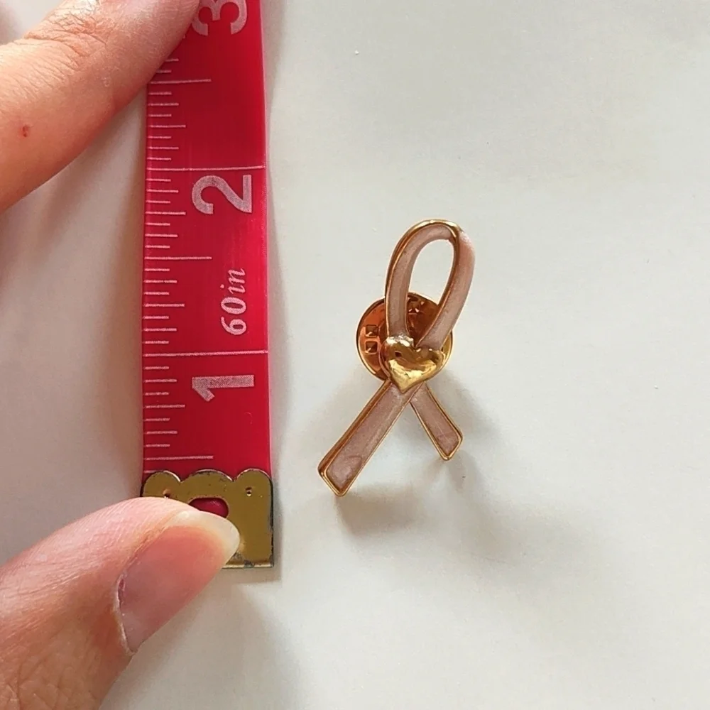 Vintage Avon pink and gold breast cancer awareness ribbon pin brooch